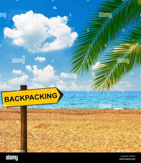 Tropical Beach And Direction Board Saying Backpacking Stock Photo Alamy