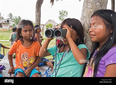 Emberå Girls At Nuevo Vigia Looking Through Binoculars At Birds Panama