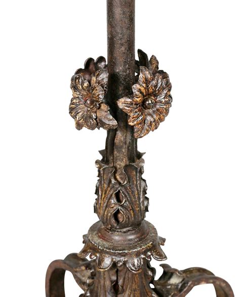 Has tin flowers and leaves on it and claw feet. Wrought Iron and Marble Floor Lamp For Sale at 1stdibs