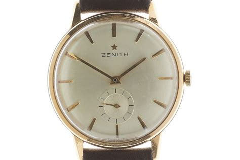 Follow these easy steps step 1. A Zenith 18ct gold manual wristwatch, sunburst dial ...