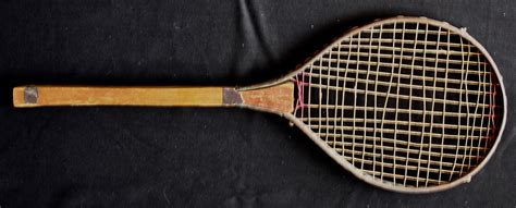Badminton racquet wood handle | Cobourg and District Sports Hall Of Fame