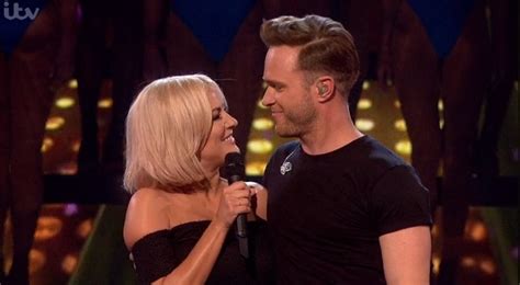 Olly Murs Performs Kiss Me Showers Caroline Flack With Kisses On Stage Celebrity News News