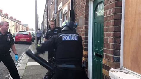 Watch Police Smash Down Doors As They Raided Homes In Search Of