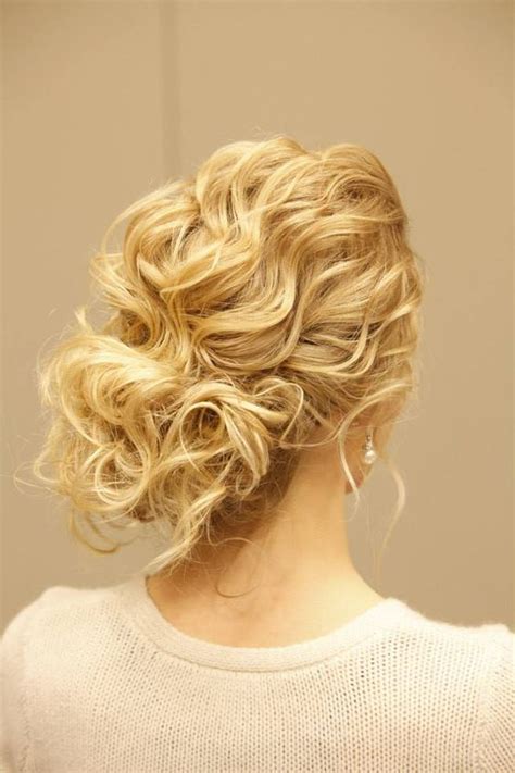 A high chignon hairstyle with curls looks natural and casual. 33 Modern Curly Hairstyles That Will Slay on Your Wedding Day