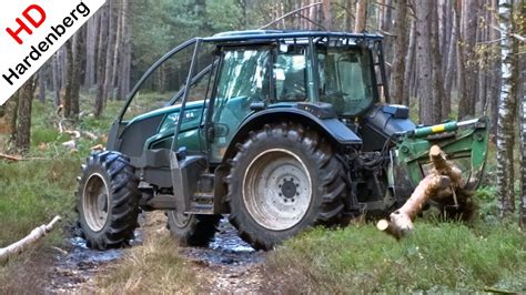 Valtra Forestry Tractor Drag Trees In The Forest At The Veluwe In