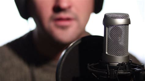 Close Up Man Singing Into A Condenser Microphone Stock Video Footage 00