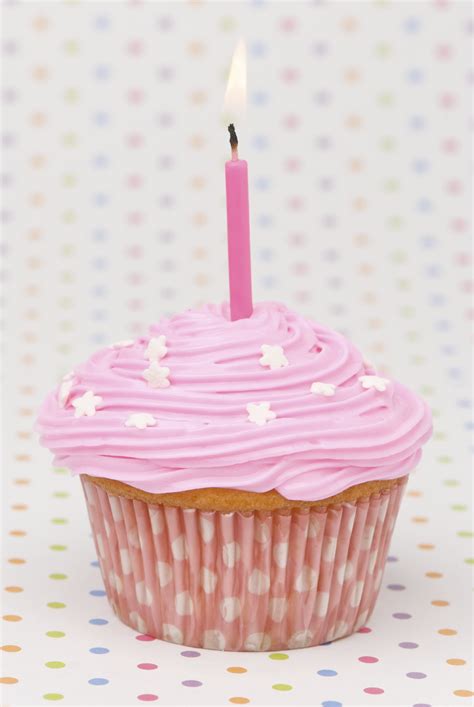 7 Happy Birthday Pink Cupcakes With Candles Photo Pink Birthday Cupcake With Candle Happy