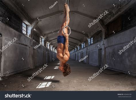 Man Hanging Upside Down On Gimnastic Stock Photo 420405238 Shutterstock
