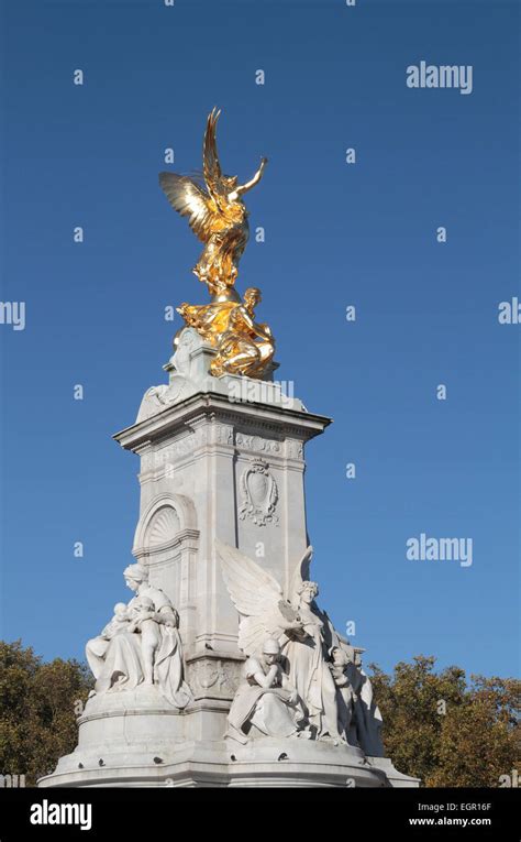 The Golden Statue On The Queen Victoria Memorial Outside Buckingham