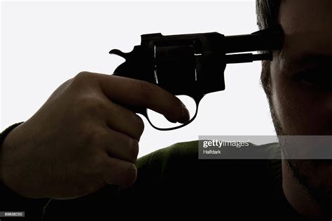 Detail Of A Man Holding A Gun To His Head High Res Stock Photo Getty