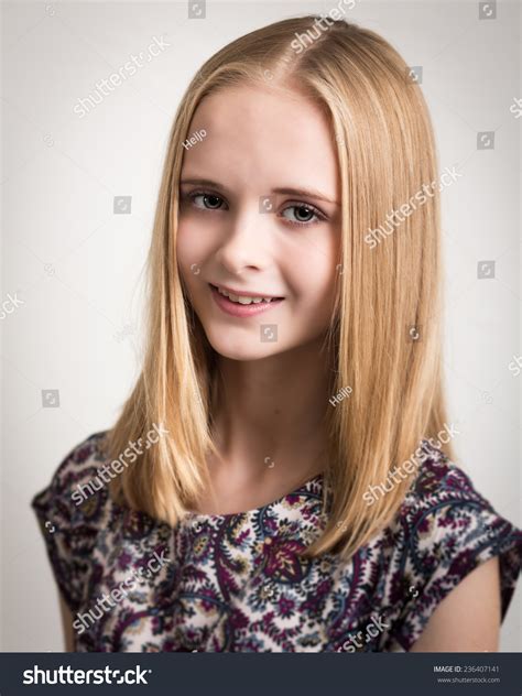 Portrait Of A Beautiful Young Teenage Girl With Long Blond