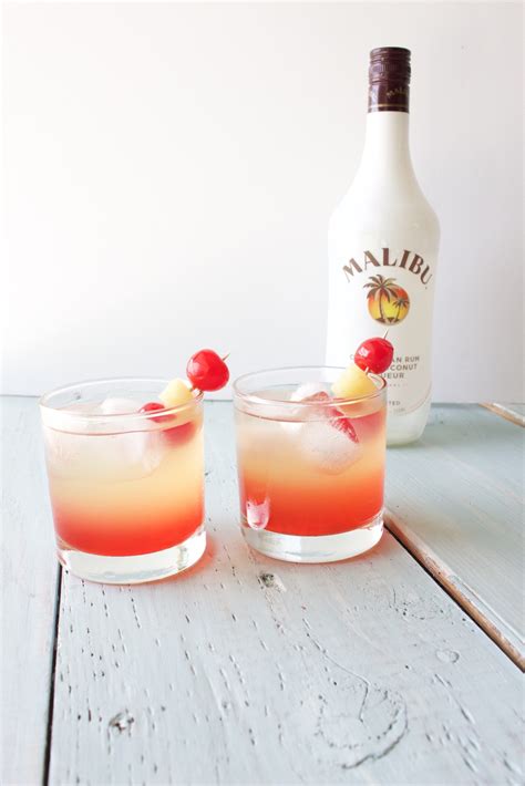 Coconut malibu rum, pineapple juice, ginger ale, and grenadine syrup will make you think you're on a tropical island with this cocktail recipe. Malibu Sunset Cocktail | Drinks alcohol recipes, Drinks ...
