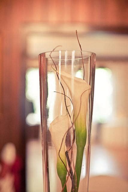 Calla Lilies And Curly Willow In A Glass Cylinder Calla Centerpiece Calla Lily Dendrobium