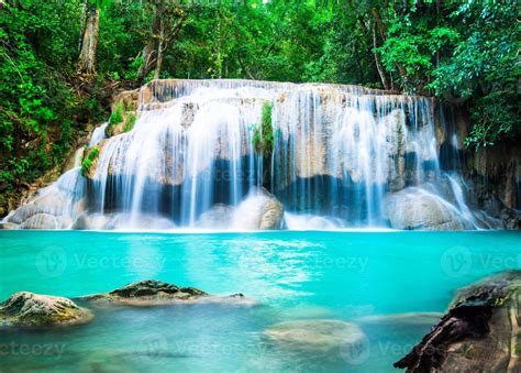 waterfall-in-the-jungle-at-kanchanaburi-province,-thailand-1324217-stock-photo-at-vecteezy