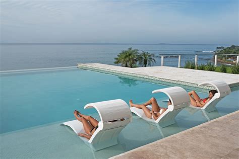 Ledge Lounger In Pool Chaise Lounge