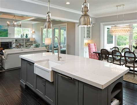The tan color of the stone pairs well with the dark cabinets and stainless steel appliances. 15 Stunning Quartz Countertop Colors To Gather Inspiration From