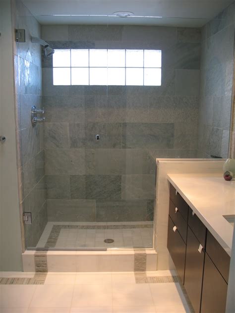Large wall tile gives the illusion that rooms are larger than they actually are. Tile Shower Designs in Marble and Granite Types Represent ...