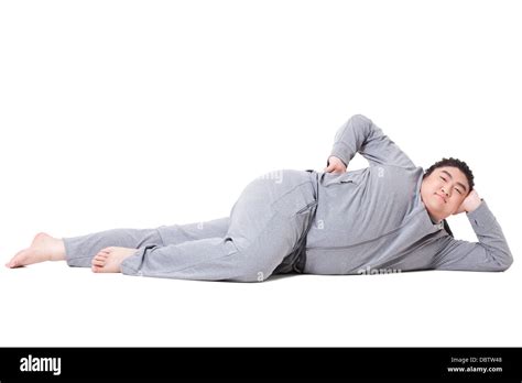 Funny Overweight Man Lying On Side Stock Photo Alamy