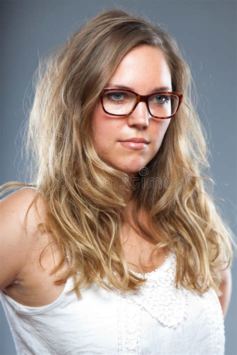 Pretty Woman With Long Brown Hair Wearing Glasses Stock