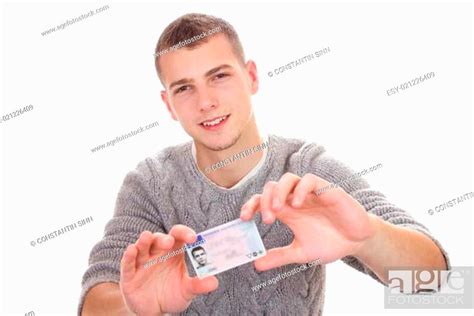 Young Man Showing His Driver License Stock Photo Picture And Low