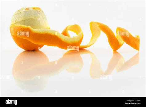 Orange With Peeled Skin Stock Photo Alamy