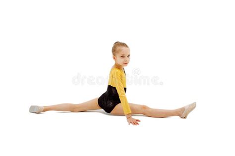 Little Girl Gymnast Sitting In The Splits Isolated On White Stock