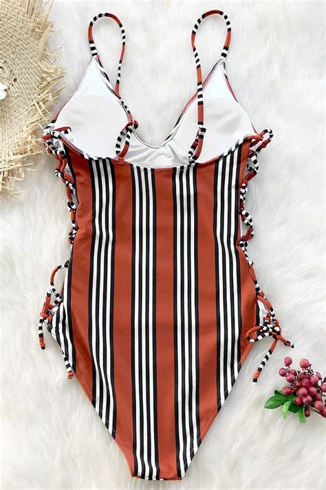 Chic And Sophisticated The Orange And Black Stripe One Piece Is A