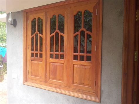 Bavas Wood Works Kerala Style Wooden Window Door Designs