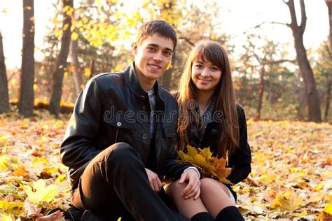 Young Happy Couple In Autumn Park Stock Image Image Of Adult Couple