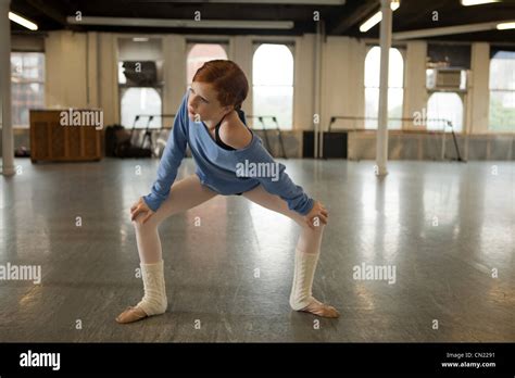 Ballet Dancer Warming Up In Dance Studio Stock Photo Alamy