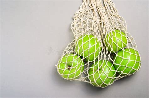 Apples In Mesh Bag Reusable Eco Friendly Cotton Bag Stock Image