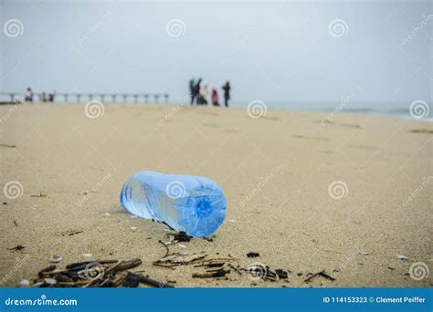 Dirty Plastic Bottle Dropped On The Beach Stock Image Image Of Environmental Nature