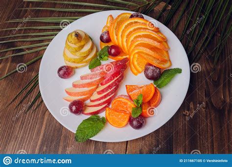 Assortment Of Sliced Fruits On Plate With Drops Stock Image Image Of