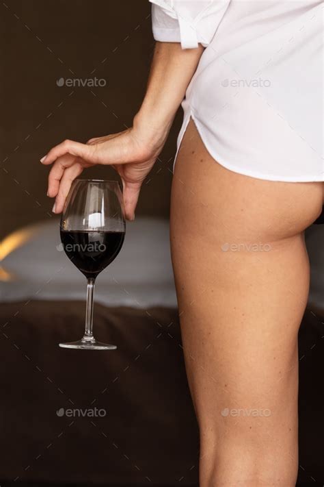 A Half Naked Beautiful Woman Drinks Red Wine Stock Photo By Fotoerfolg