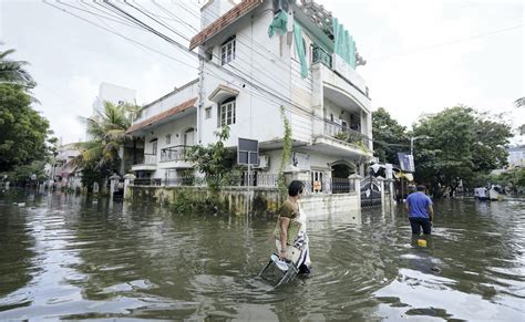 flood hit chennai limps to normalcy rajnath singh s aerial survey today