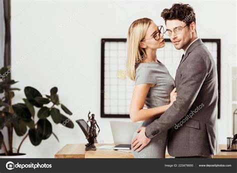 Young Lawyers Hugging Each Other While Standing Office Flirt Office