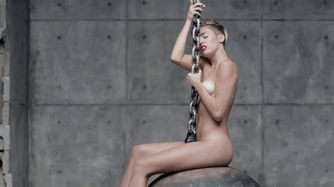 All About Music Miley Cyrus Strips Swings Around Naked In Wrecking Ball Video Watch