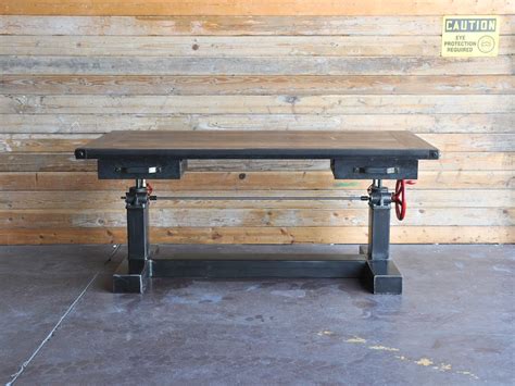 This standing desk is made from 2x12s wood board and plumbers pipe. Crank Sit Stand Desk | Vintage Industrial Furniture