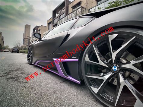 The black band that traces a v on the hood and extends over the roof to the rear of the car is, according to bmw, a signature feature of the i brand. BMW I8 front lip after lip rear spoiler side skirts hood carbon fiber body kit