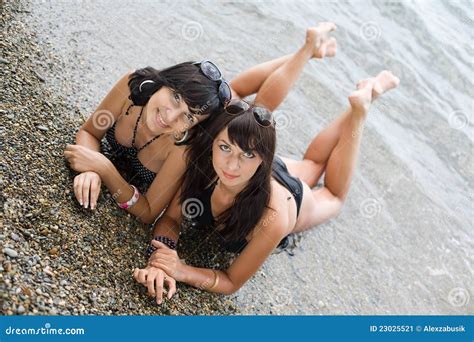 two girls on wild seashore stock image image of long 23025521