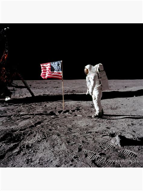 Astronaut Salutes The American Flag During An Apollo 11 Moonwalk