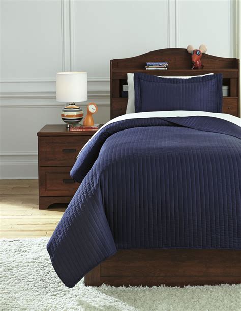 Raleda Navy Twin Coverlet Set From Ashley Coleman Furniture