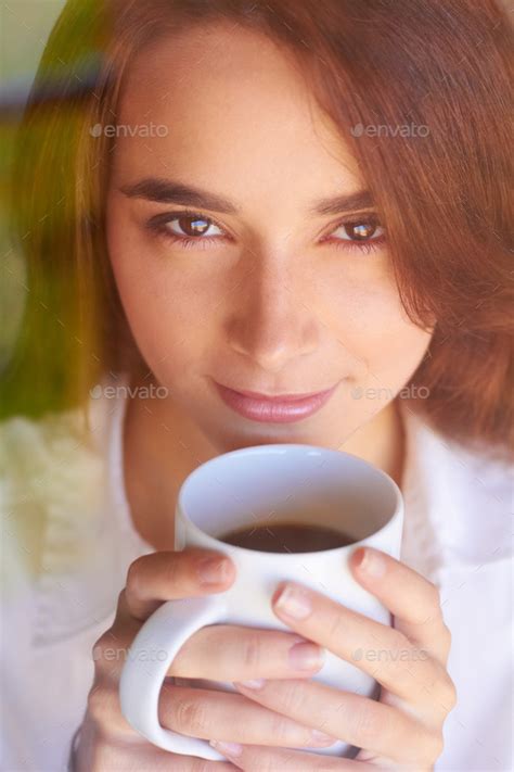 Mornings Are Made Of This Shot Of An Attractive Woman Holding Her