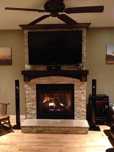 Stone On Fireplace With Tv Mounted Over Mantle Home Fireplace Tv