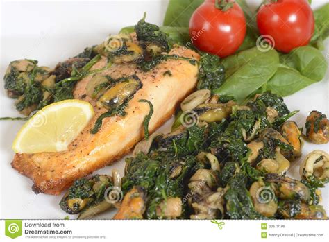 Grilled Salmon With Seafood And Spinach Royalty Free Stock