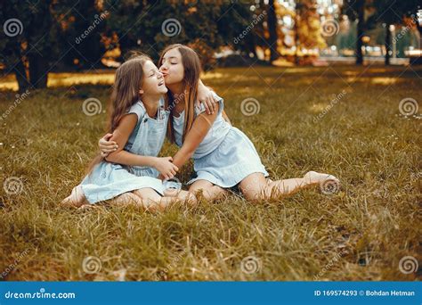 Two Cute Girls Have Fun In A Summer Park Stock Image Image Of Female