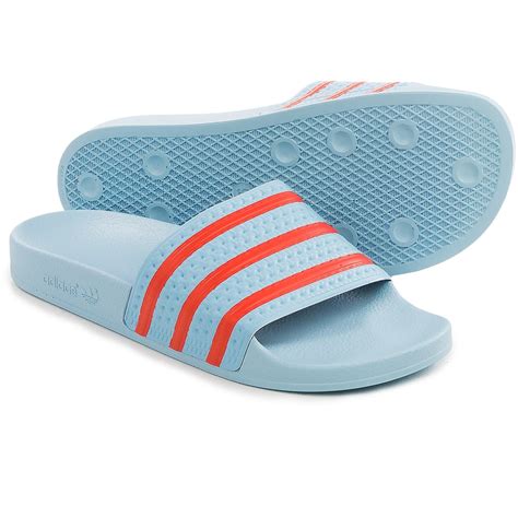 All styles and colours available in the official adidas online store. adidas Adilette Slide Sandals (For Men) - Save 50%
