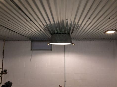 12' corrugated steel panels are great for multiple applications at your home or at your business. Clever light fixture and corrugated steel ceiling in this ...