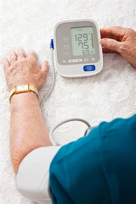 Monitoring Blood Pressure Stock Photo Image Of Male 25698556