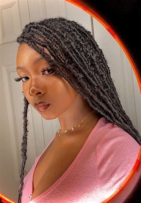 High bun faux locs this hairstyle is suitable most especially when you have the long goddess faux locs. @radiantdoll 💕 in 2020 | Faux locs hairstyles, Hair styles ...